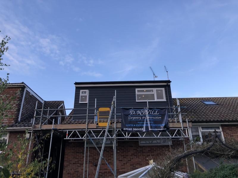 Completed dormer with dark cladding