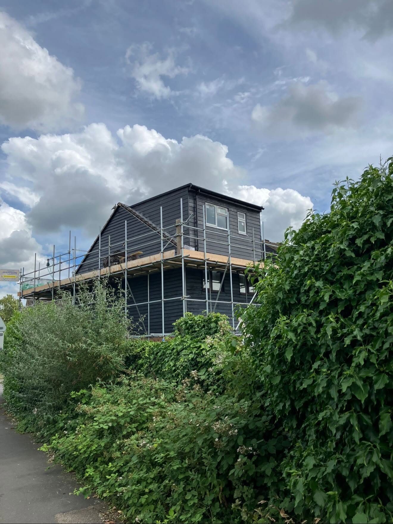 Black clad loft conversion exterior